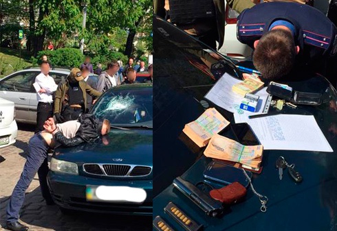 Київські міліціонери вимагали 5 тис доларів - фото