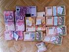 Під час обшуків у двох керівників столичної ДАІ вилучено 3 млн грн