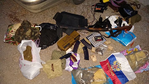 Терористи «ДНР» приховали 12 кг пластиду та зброю - фото