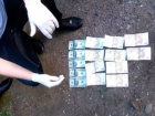 На Буковині підполковник поліції вимагав у підлеглого 500 доларів і 500 євро