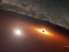 Телескоп Спітцера показав точний момент в танці чорних дір