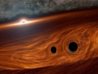 Зіткнення чорних дір може вибухати зі світлом