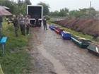 Убитых террористов в Славянске похоронили у дороги под забором