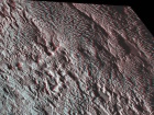 Участок поверхности Плутона, напоминающую змеиную кожу, показала НАСА