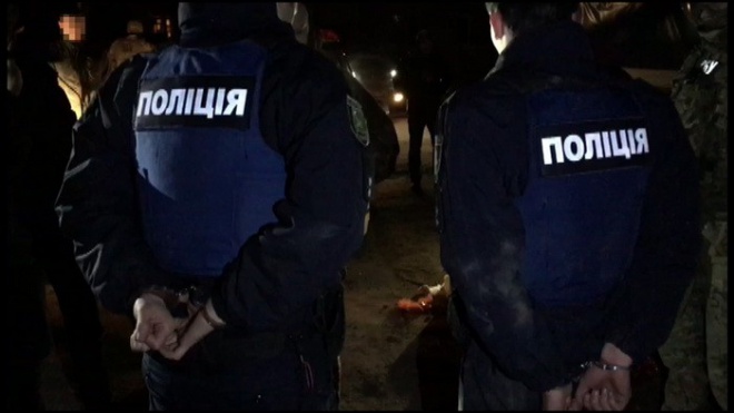 В Харькове разоблачили патрульных на систематическом вымогательстве взяток у водителей - фото
