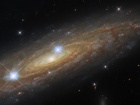 Хаббл сделал снимок потрясающей спиральной галактики сбоку