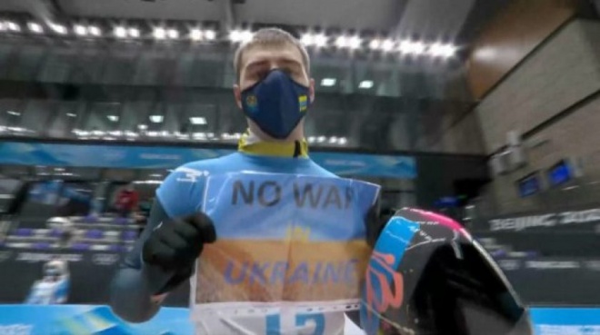 Украинский спортсмен на Олимпиаде: "Нет войне в Украине" - фото