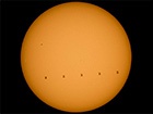 Фотографію МКС, що пролітає на тлі Сонця, показала NASA