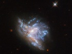 Габбл показав вражаюче зіткнення двох галактик