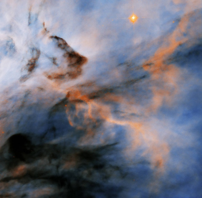 Хаббл виявив, що пекучі зорі туманності Полум′я можуть зупинити планетоутворення - фото