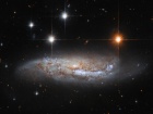 Хаббл спостерігає галактику з вибуховим минулим