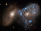 Хаббл показав “космічний трикутник”, створюваний зіткненням галактик