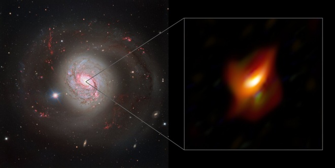 Надмасивна чорна діра спіймана схованою в кільці космічного пилу - фото