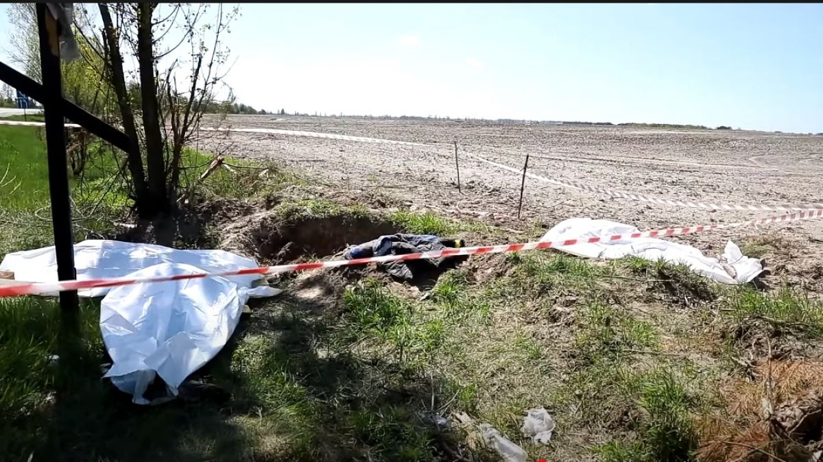 На Київщині виявлено ще одне масове поховання вбитих цивільних - фото