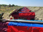 На Луганщині поховали рештки 58 “мобіків”