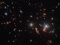 “Вебб” показав вигинання простору-часу галактичним скупченням