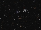 “Вебб” виявив найвіддаленішу активну надмасивну чорну діру