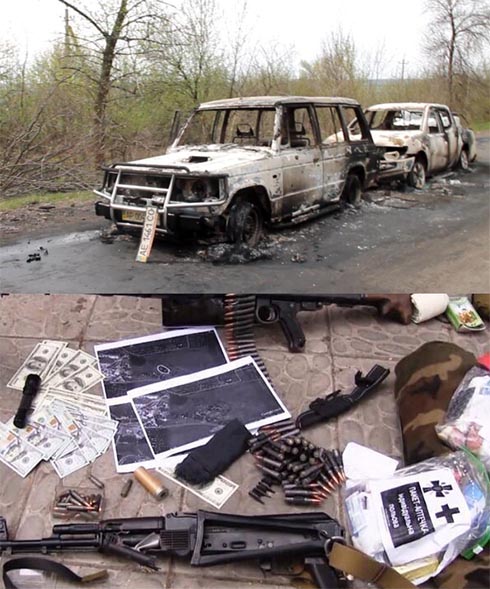 машины, на которых штурмовали блокпост под Славянском, сгорели, но вещи внутри - целы. фото