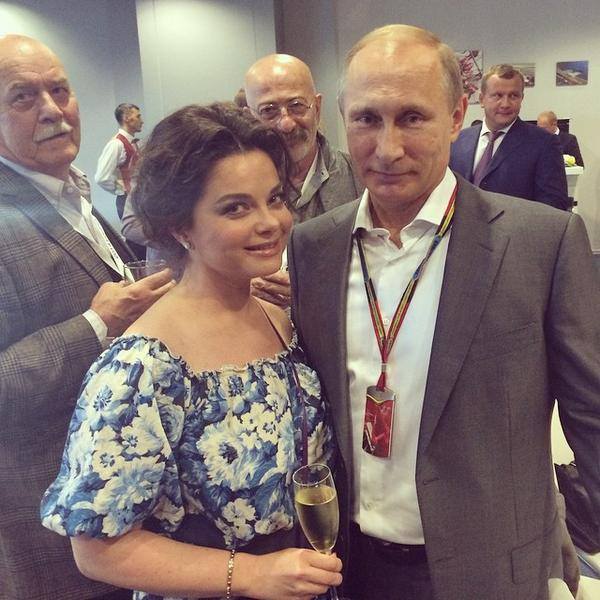 Путін і Корольова на фото