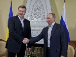 Янукович полетел к Путину