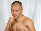 Украинский боксер Глазков по очкам победил поляка Адамека