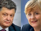 Порошенко и Меркель констатировали, что обстрелы боевиков угрожают плану мирного урегулирования