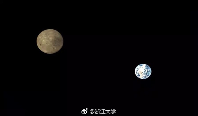 Китайский спутник показал вид обратной стороны Луны на фоне Земли - фото