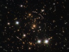 Хаббл сфотографировал дюжину двойников галактики