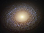 Хаббл показал «пернатую» спиральную галактику
