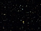 Астрономы обнаружили протяженный ореол темной материи вокруг древней карликовой галактики