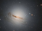 Хаббл показал галактику с невыразительными нитями