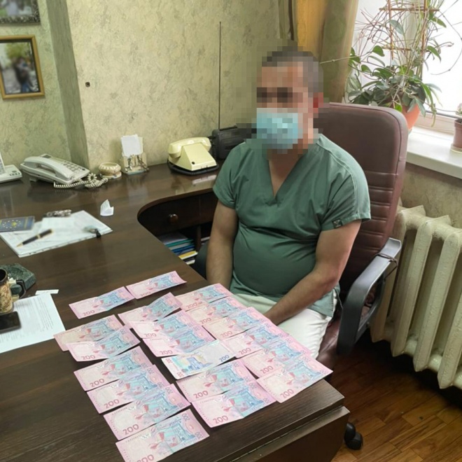 В Киеве врачи разоблачены во взяточничестве: требовали деньги за подготовку и выдачу умерших - фото