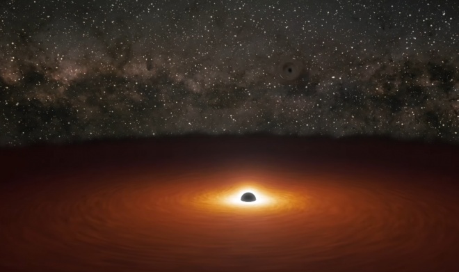 Найдена галактика с двойной сверхмассивной черной дырой - фото