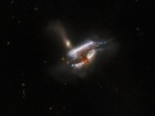 Хаббл показал бурное галактическое трио