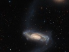 Хаббл показал длиннорукую галактику