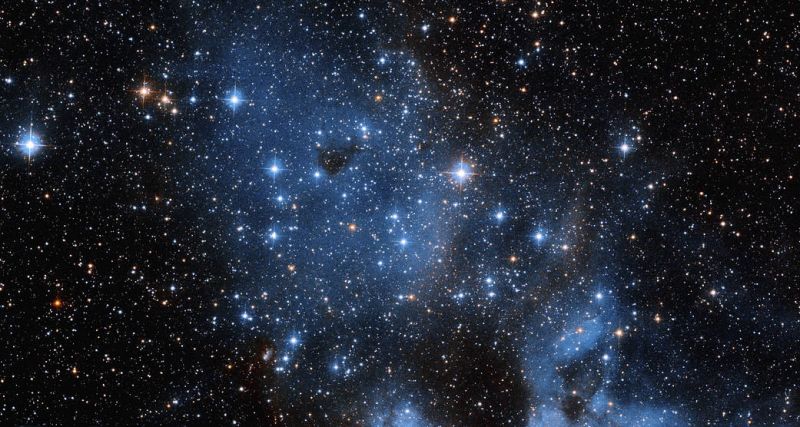 Хаббл показал дуэт эмиссионной туманности и звездного скопления - фото